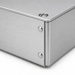 Close-up of folded and riveted corner seam on custom aluminum instrument enclosure