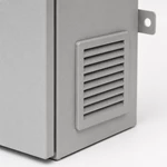Close-up of angled ventilation louvers on a powder-coated outdoor electrical enclosure for airflow and rain protection