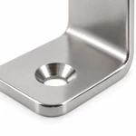 Close-up of a countersunk hole and rounded edge on a stainless steel marine bracket