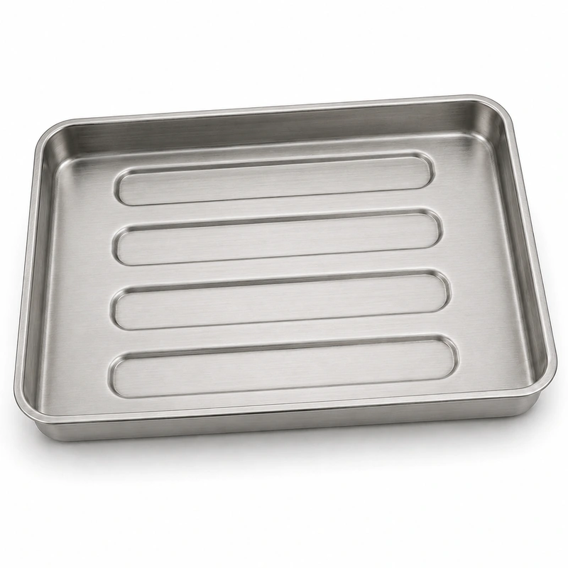 Brushed stainless steel surgical instrument tray with five separate rounded rectangular recessed slots and formed perimeter flange
